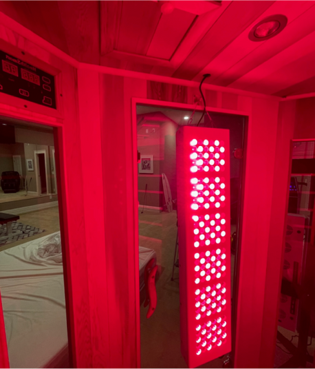Inside view of the Healthsmart 4-person full spectrum corner infrared sauna featuring infrared lights.