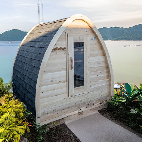 Front and side roof view of a Mini POD Sauna with an ocean background.