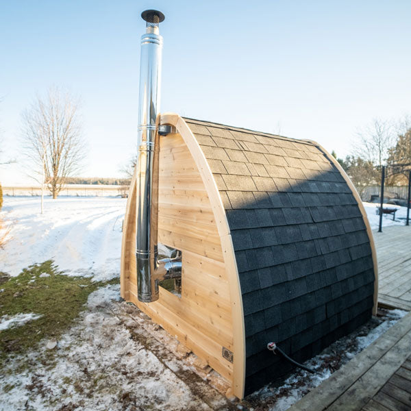 Back view of a Mini POD Sauna with a flue pipe.