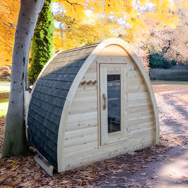 Front and left side roof view of a Mini POD Sauna under the tree.