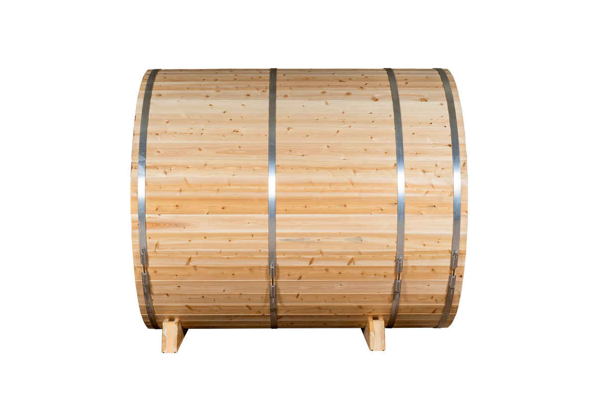 Side view of the Serenity MP Barrel Sauna, highlighting its curved design and exterior features.