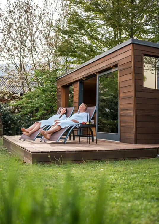 Modern wooden garden pod with a deck for relaxation.