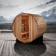 A lifestyle image of the Golden Designs Arosa 4-Person Traditional Barrel Sauna