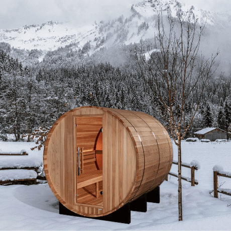 A lifestyle image of the Golden Designs Zurich 4-Person Traditional Barrel Sauna