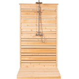 Distant front view of the Savannah Outdoor Shower featuring a cedar pillar, highlighting its rustic charm and outdoor aesthetics.