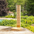 Sierra Outdoor Shower with a wooden cedar post, highlighting its rustic design and outdoor functionality.