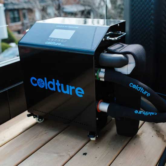 Cold storage chiller viewed from a slight side front angle, showcasing its fittings and design.